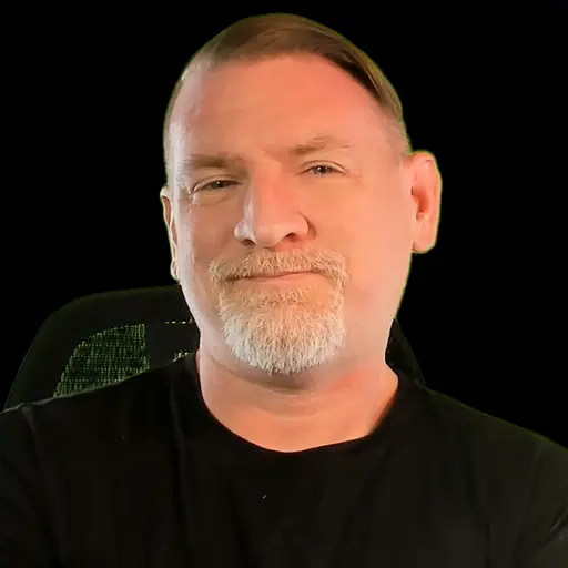 Professional portrait of a man with a beard and short hair for VerifyTreatment.